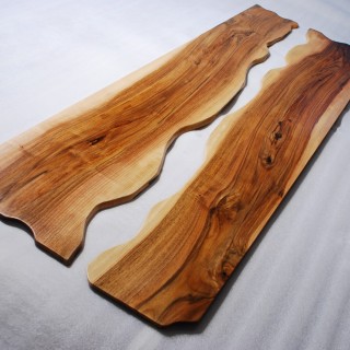 Planks of Walnut, natural color, edges on one side partly natural